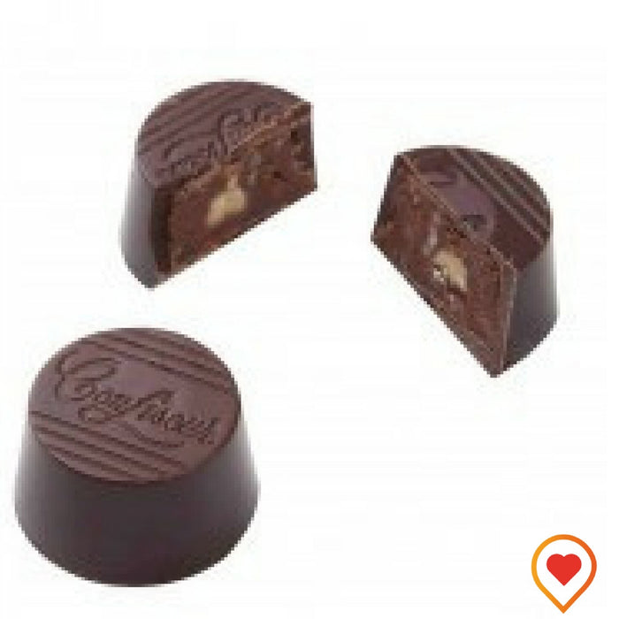 This soft almond praline blended with dark Chocolate ganache makes a great crunchy delight - foodwalas.com